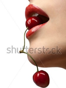 cropped-stock-photo-young-woman-s-mouth-with-red-cherries-over-white-background-560403194.jpg